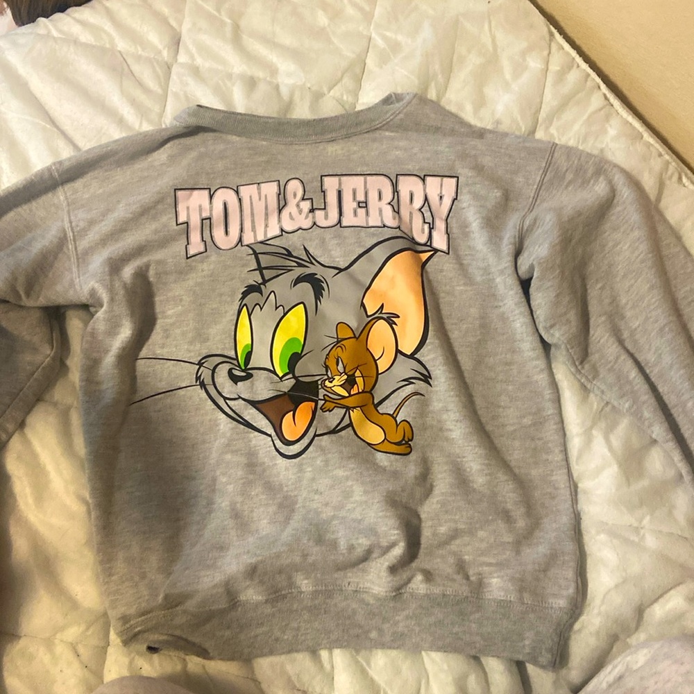 Gray Tom and Jerry sweater for $15. It was originally $30 when I got it. Notworn